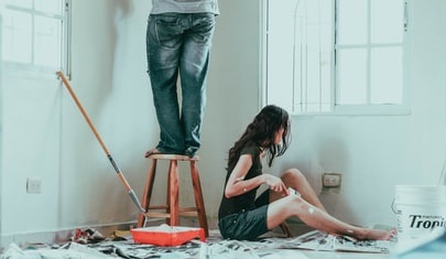 Couple Painting the room